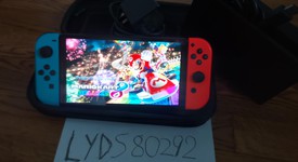 Good
													Nintendo Switch - OLED - Red & Blue, 64 GB, photo 3 of 12