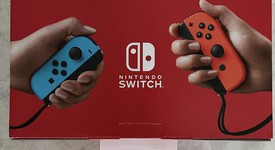 New
													Nintendo Switch - Red & Blue, 32 GB, photo 1 of 3