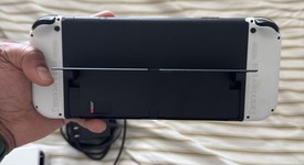 Mint
													Nintendo Switch - OLED - White, 64 GB, photo 6 of 6