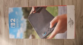 New
													Nintendo Switch 2 - Red & Blue, Standard, photo 5 of 7