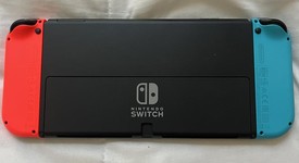 Mint
													Nintendo Switch - OLED - Red & Blue, 64 GB, photo 5 of 9