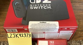 New
													Nintendo Switch 2 - Red & Blue, Standard, photo 2 of 2