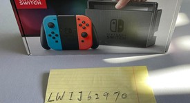 Mint
													Nintendo Switch - Red & Blue, 32 GB, photo 1 of 12