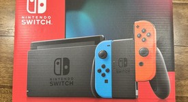 New
													Nintendo Switch - Red & Blue, 32 GB, photo 1 of 3