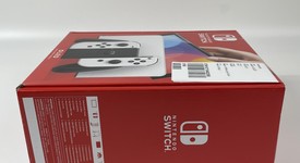 New
													Nintendo Switch - OLED - White, 64 GB, photo 5 of 6
