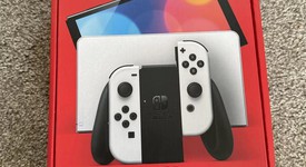 Good
													Nintendo Switch - OLED - White, 64 GB, photo 1 of 10