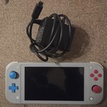Fair Nintendo Switch Lite - Gray, Zacian and Zamazenta Edition