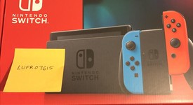 New
													Nintendo Switch - Red & Blue, 32 GB, photo 1 of 2