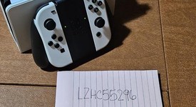 Mint
													Nintendo Switch - OLED - White, 64 GB, photo 2 of 52