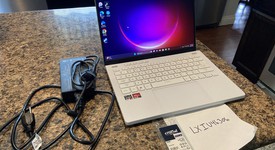 Good
													Asus ROG Zephyrus G14 (2022) GA402 - Ryzen 9, White, 1 TB, 24 GB, QHD+, photo 1 of 14