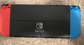Good
													Nintendo Switch - OLED - Red & Blue, 64 GB, photo 4 of 9