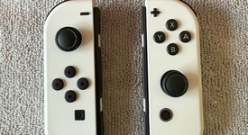 Mint
													Nintendo Switch - OLED - White, 64 GB, photo 4 of 8