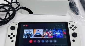 Mint
													Nintendo Switch - OLED - White, 64 GB, photo 2 of 9