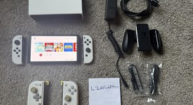 Mint
													Nintendo Switch - OLED - White, 64 GB, photo 1 of 21
