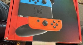New
													Nintendo Switch - Red & Blue, 32 GB, photo 2 of 2