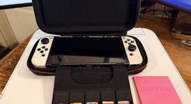 Mint
													Nintendo Switch - OLED - White, 64 GB, photo 2 of 26