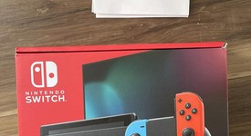 New
													Nintendo Switch - Red & Blue, 32 GB, photo 1 of 5
