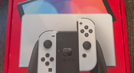 New
													Nintendo Switch - OLED - White, 64 GB, photo 1 of 7