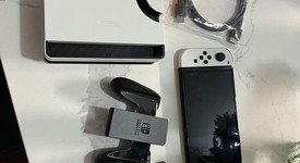 Mint
													Nintendo Switch - OLED - White, 64 GB, photo 2 of 12