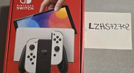 Mint
													Nintendo Switch - OLED - White, 64 GB, photo 2 of 39