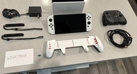 Mint
													Nintendo Switch - OLED - White, 64 GB, photo 3 of 8