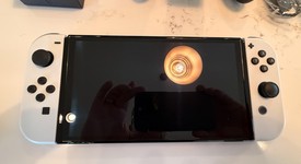 Good
													Nintendo Switch - OLED - White, 64 GB, photo 1 of 8