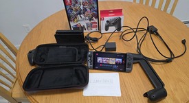 Mint
													Nintendo Switch - OLED - Black, 64 GB, Super Smash Bros., photo 3 of 10