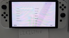 Mint
													Nintendo Switch - OLED - White, 64 GB, photo 1 of 13