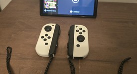 Mint
													Nintendo Switch - OLED - White, 64 GB, photo 5 of 13