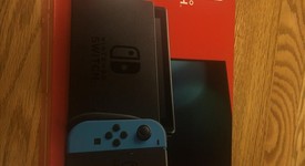 New
													Nintendo Switch - Red & Blue, 32 GB, photo 1 of 3