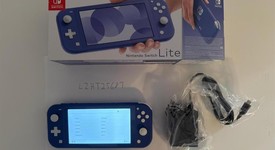 Mint
													Nintendo Switch Lite - Blue, photo 1 of 9