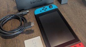 Mint
													Nintendo Switch - Red & Blue, 32 GB, photo 1 of 8