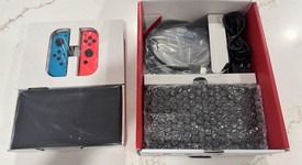 Good
													Nintendo Switch - OLED - Red & Blue, 64 GB, photo 3 of 11