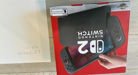New
													Nintendo Switch 2 - Red & Blue, Standard, photo 2 of 6