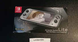 New
													Nintendo Switch Lite - Gray, Dialga & Palkia Edition, photo 1 of 6
