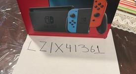 New
													Nintendo Switch - Red & Blue, 32 GB, Mario Red & Blue Edition, photo 1 of 4