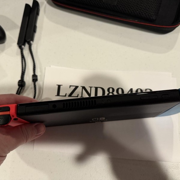 Nintendo Switch - OLED - 64 GB, Red & Blue