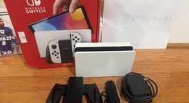 Good
													Nintendo Switch - OLED - Black, 64 GB, Super Smash Bros., photo 4 of 16