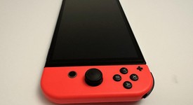 Mint
													Nintendo Switch - OLED - Red & Blue, 64 GB, photo 5 of 10