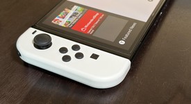 Mint
													Nintendo Switch - OLED - White, 64 GB, photo 4 of 9
