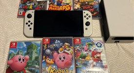 Good
													Nintendo Switch - OLED - Black, 64 GB, Super Smash Bros., photo 1 of 8