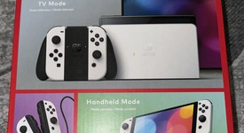 New
													Nintendo Switch - OLED - White, 64 GB, photo 2 of 4