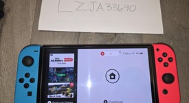Good
													Nintendo Switch - OLED - Red & Blue, 64 GB, photo 1 of 8