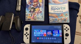 Mint
													Nintendo Switch - OLED - White, 64 GB, photo 4 of 15