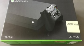 Mint
													Xbox One X (2017) - Black, Standard, photo 1 of 7