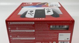 New
													Nintendo Switch - OLED - White, 64 GB, photo 4 of 6