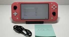 Fair
													Nintendo Switch Lite - Coral, photo 1 of 8