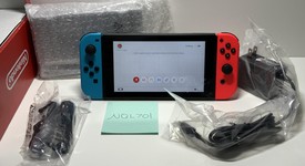 Mint
													Nintendo Switch - Red & Blue, 32 GB, photo 1 of 6