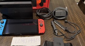 Good
													Nintendo Switch - OLED - Red & Blue, 64 GB, photo 4 of 4