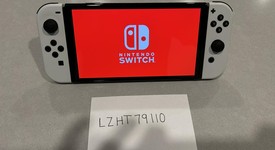 Mint
													Nintendo Switch - OLED - White, 64 GB, photo 1 of 8